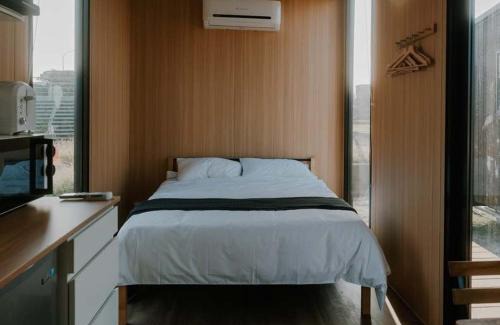 Fuxing Apartment | Fulu Dragon Boat Camping House 2 by Tiny Away