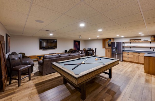 Waverly House | Game Room + Patio: 'Bremer House Waverly Rental'