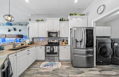 Tropic House | Game Room Theater Luxurious Waterfront Retreat