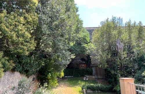 Barri Vell Apartment | Gardens of Roman wall host ONYARAPARTMENTS