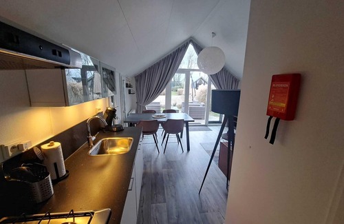 Municipality of Dronten Ski Chalet | Gemütliches Holland-beachhouse 40m² mit Garten, Blick Aufs Wasser im Ferienpark