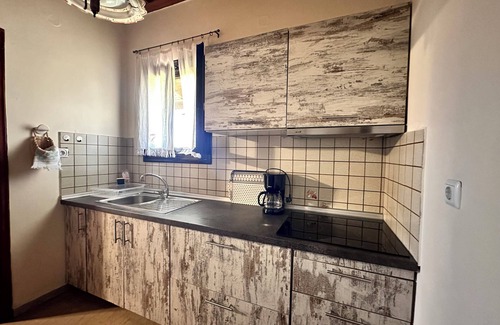 Pyrgos Apartment | Genari Beach Apartments – Cozy Apartment with Sea & Garden Views