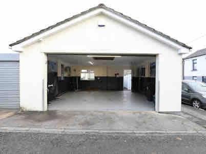 Pentrebach House | Gethin Lodge cosy Holiday cottage in Abercanaid 5mins from BPW with secure double garage with cctv sleeps up to 6 guests