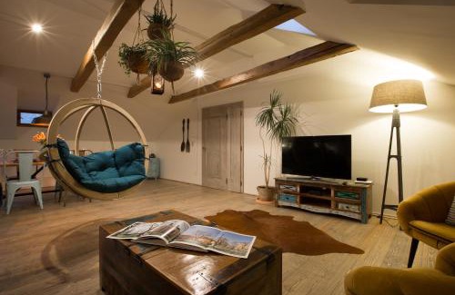 Prague 1 Apartment | Gigantic Boho Chic 3 Bedroom 3 Bathroom Loft with Hanging Chair