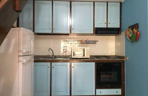 Santa Margherita di Pula House | Giulia terraced house in the shade of pine trees 500 meters from the beach.