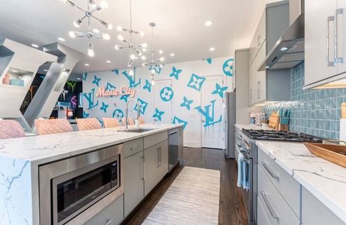 Katie Hill Neighborhood Villa | Glamour on the Rocks - Fashion Haus - Couture Murals & Rooftop Views