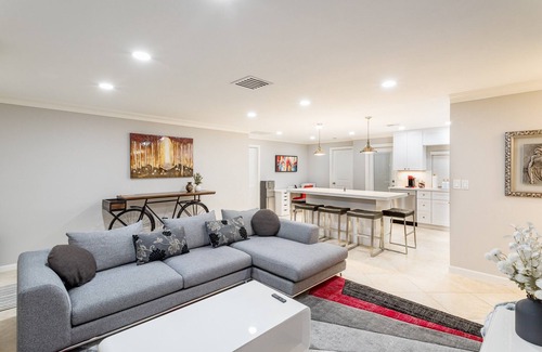 Boynton Beach House | Golfers Green Retreat with 35' Heated Saltwater Pool & Tiki. Pet Friendly!