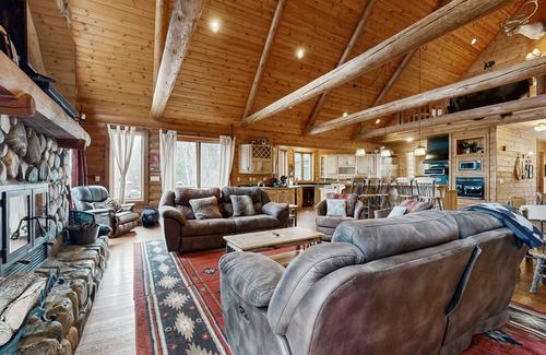 Three Lakes House | Gorgeous lakefront lodge with dock, deck, game room & firepit