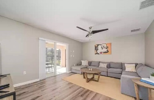 Lake Wilson Preserve House | Gorgeous water view from South facing pool deck. Balcony off upstairs master bed