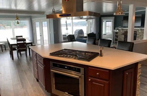 Retsil House | Gorgeous waterfront home with new hot tub and beautiful afternoon sunsets.