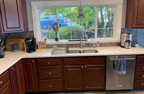 Retsil House | Gorgeous waterfront home with new hot tub and beautiful afternoon sunsets.