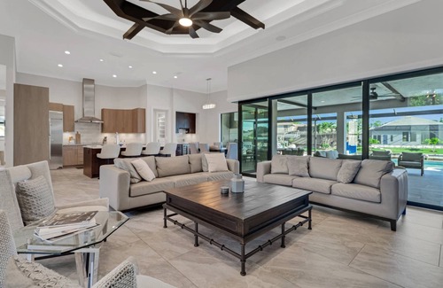 Pelican House | Gorgeous Waterfront Retreat! Stunning Outdoor Space w/Heated Pool, Spa & Outdoor Kitchen!