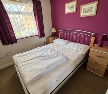 Scratby Ski Chalet | Green Farm, Three Bedroom chalet, pet friendly, FREE WiFi, FREE entry to clubhouse, FREE pool passes plus bed linen and towels included