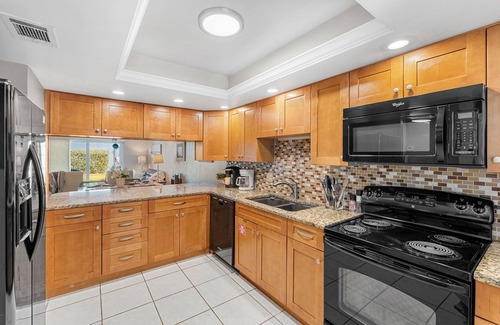 South Patrick Shores Condo | Ground Floor Beachfront Coastal Getaway w/Pool & Beach Views