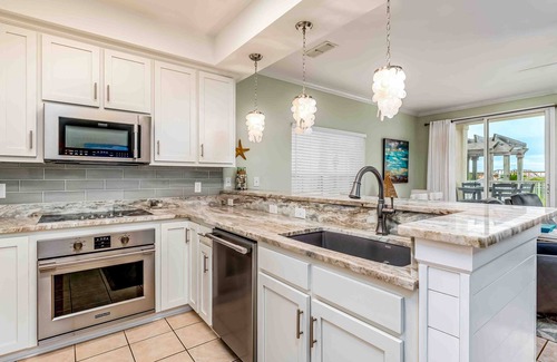 Dauphin Island Condo | Ground-floor condo next to on-site pool with private patio & beach access