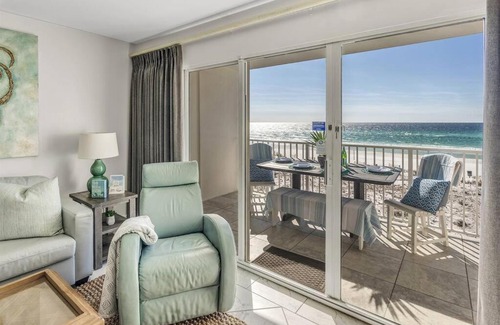 Fort Walton Beach Apartment | Gulf Dunes 314 Sunny & Chair