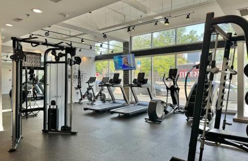 Near West Side Apartment | Gym Garage Parking Balcony Sleeps 4