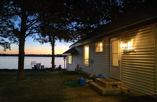 Lindstrom Cabin | Hamptons style Lake house on Sunset point. With water on both the east and west!