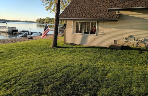 Lindstrom Cabin | Hamptons style Lake house on Sunset point. With water on both the east and west!