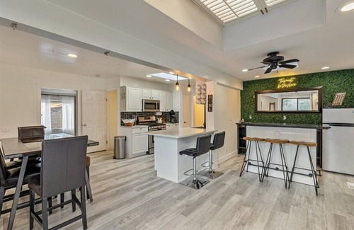West Valley City House | Heated Pool & Hot Tub open all year with King Beds, Bar & Much More
