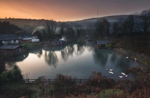 Caerwys Resort | Herons Lake Retreat Hot Tub Lodges