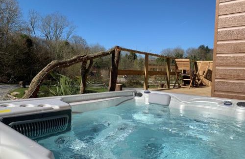 Caerwys Resort | Herons Lake Retreat Hot Tub Lodges