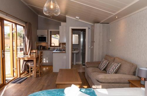 Caerwys Resort | Herons Lake Retreat Hot Tub Lodges