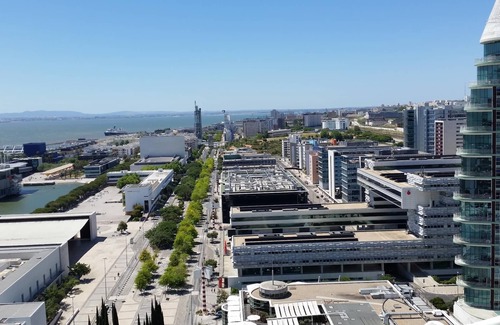 Parque das Nacoes Apartment | High Floor Apartment in Tower with Panoramic Balcony Over Rio EXPO09
