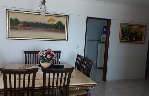 Guilhermina Apartment | High standard beach front av beach with parasol chairs installed on the beach