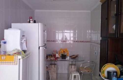 Guilhermina Apartment | High standard beach front av beach with parasol chairs installed on the beach