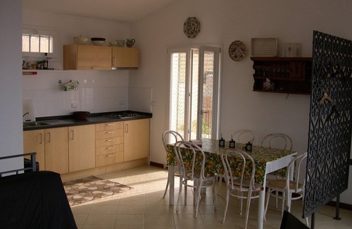 Poggi House | Hillside overlooking the sea