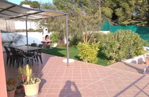 Poggi House | Hillside overlooking the sea