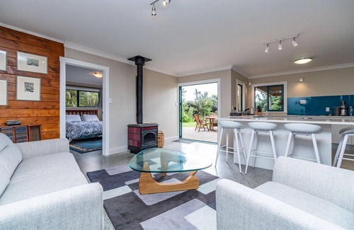 Mangawhai House | Hilltop Retreat - This large home with views in a serene setting is a great spot for your next family retreat