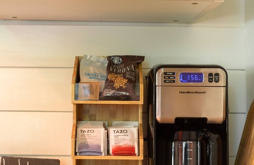 Asheville Cabin | Hip New Scandi cabin + Airstream, hot tub, fire pit, creekside, Uber downtown.