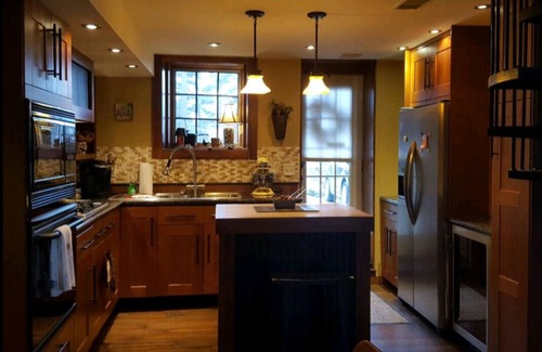 Le Claire Cottage | Historic Cottage in LeClaire w/full river views and 3 decks. Dogs welcome