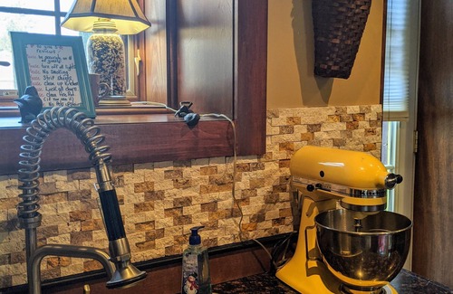 Le Claire Cottage | Historic Cottage in LeClaire w/full river views and 3 decks. Dogs welcome