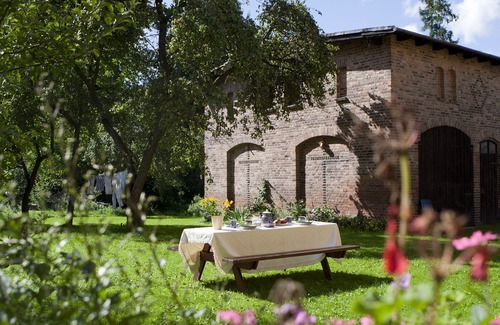 Janowice Wielkie House | Historic holiday home for families and groupsnwith garden and play barn.