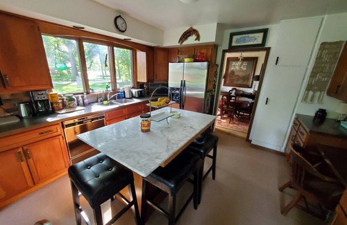 Fremont House | Historic Riverside Retreat with Modern Comforts in Fremont, Ohio