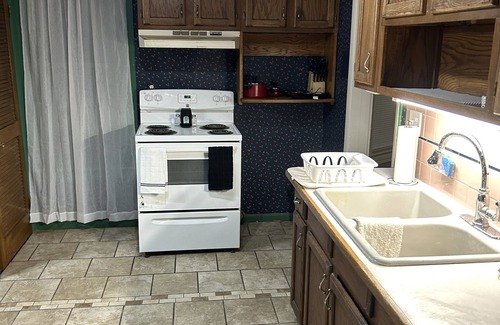 Olean Apartment | Historical District Getaway [Upper]