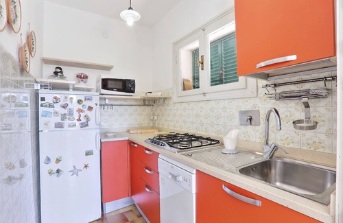 Capoliveri Apartment | Holiday Apartment "Il Giardino Nel Sole Trilo" with Air Conditioning, Garden and Terrace