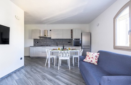 Bari Sardo House | Holiday Apartment LaTorre with Balcony, Terrace and Shared Garden