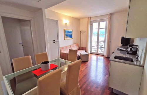 Meina Apartment | Holiday apartment with air conditioning, balcony and WLAN