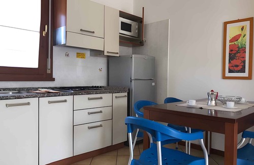 Bibione Apartment | Holiday apartment with communal pool and air conditioning