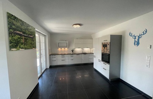 Muritz House | Holiday Home 'Ferienhaus Rechlin' with Private Terrace, Private Garden and Wi-Fi