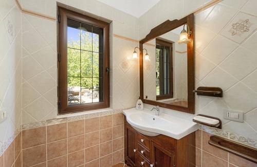 Iglesias House | Holiday Home For Families 'Maria Maddalena 3' with Mountain View, Shared Pool & Wi-Fi