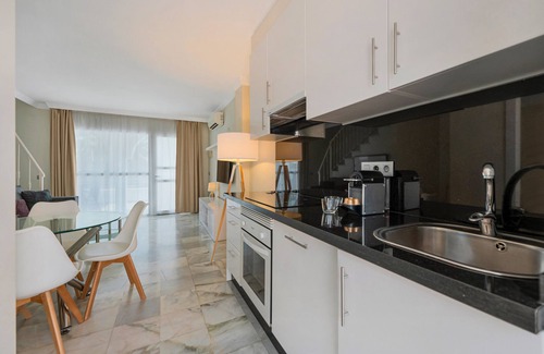 Urbanizacion Hacienda las Chapas House | Holiday Home 'Latifa' with Shared Pool, Wi-Fi and Air Conditioning