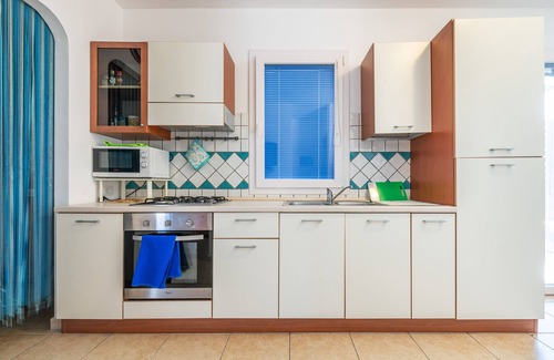 Calasetta House | Holiday Home "Sottotorre 1" close to the Sea with Private Garden & A/C