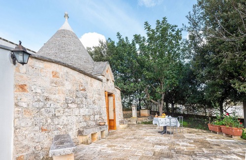 Ostuni House | Holiday Home "Trullo Nova - Ostuni" with Garden & A/C