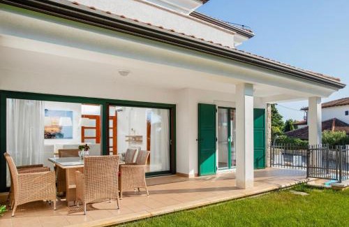 Basanija House | Holiday Home Villa Beach Front by Interhome