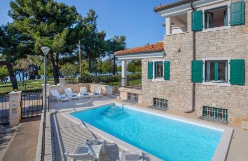 Basanija House | Holiday Home Villa Beach Front by Interhome